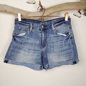 Levi's high rise distressed denim shorts